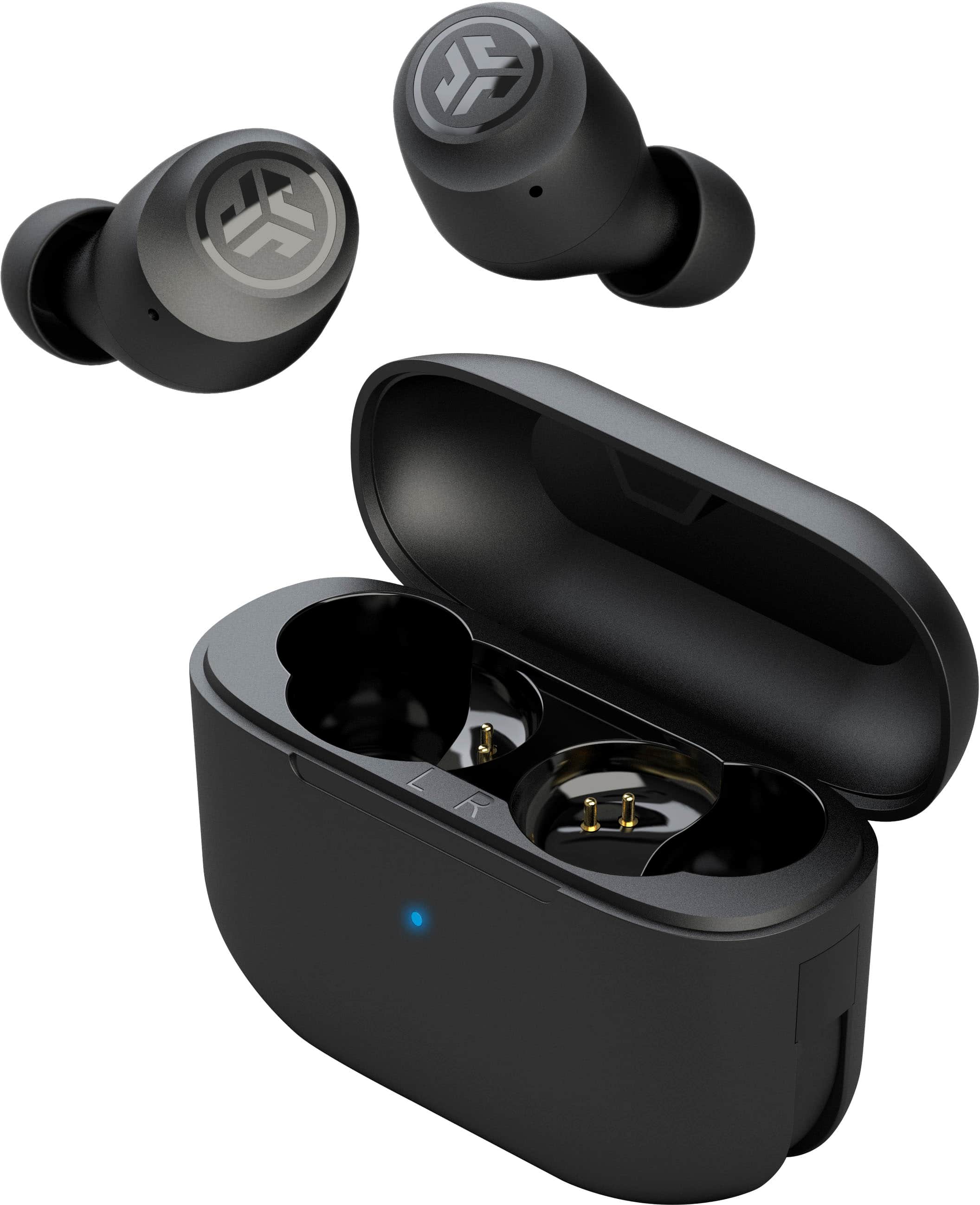 JLab GO Air POP true wireless earbuds being unboxed on a wooden desk